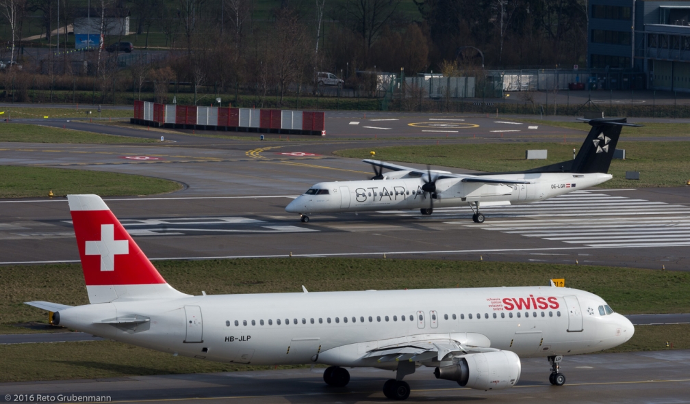 Swiss_A320_HB-JLP_AustrianAirlines_DH8D_OE-LGR_ZRH160326
